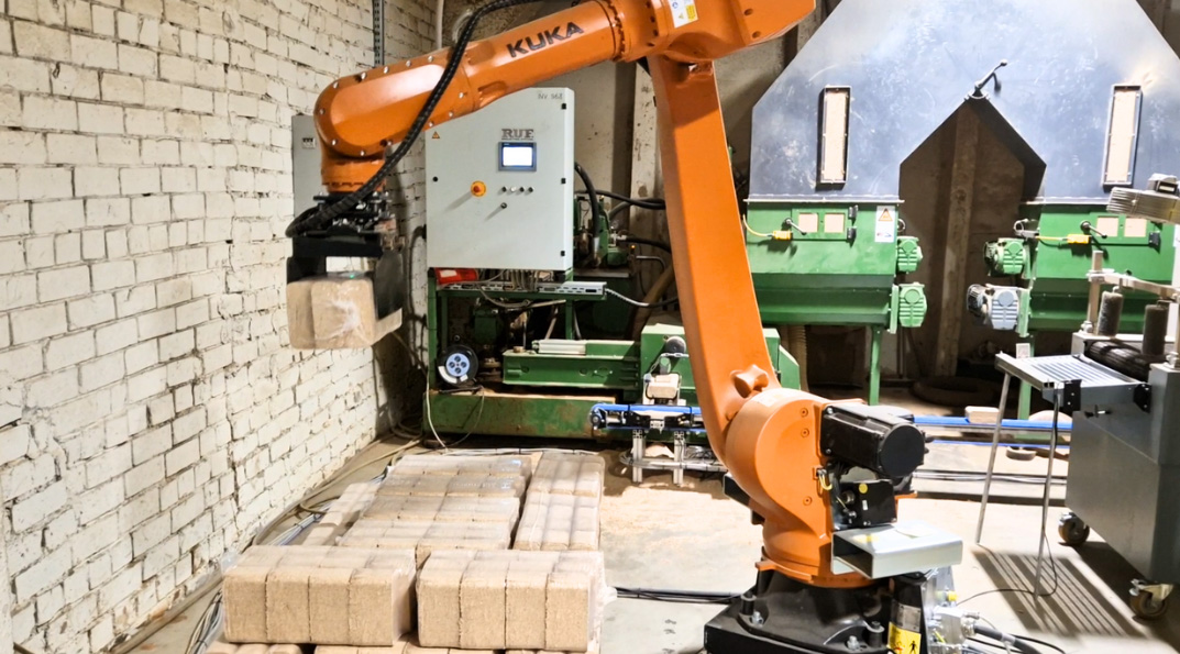 automated wood briquette packing